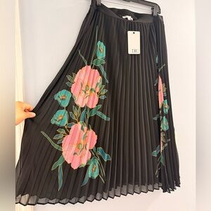 DR2 Pleated Midi Skirt with Floral Accents
